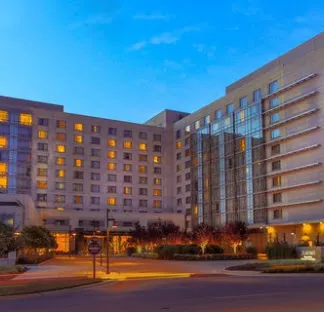 Elegant hotel plaza representing accommodations near the Get Going Girl Summit 2026