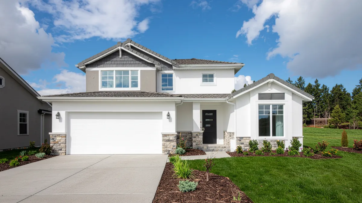 Modern home with a new concrete driveway and clean curb appeal in Aurora, CO