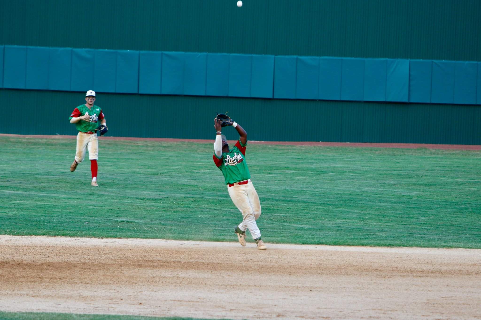 grayscale photo of children playing baseball