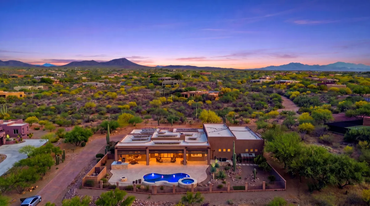 Twilight aerial of a Vail, AZ lifestyle home listed by Meagan Estees