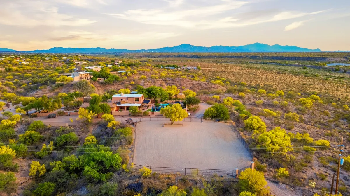 Aerial of a Southern Arizona horse property with mountain views