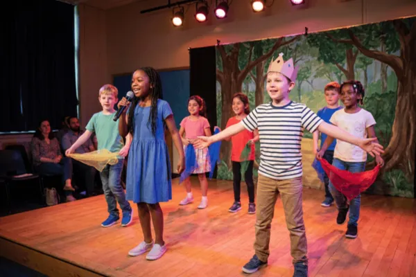 children on stage