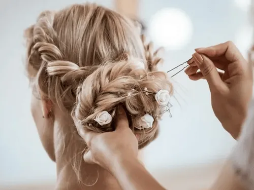black and white bird on green grass during daytime