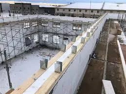 Large commercial ICF building under construction with ICF wall forms and scaffolding