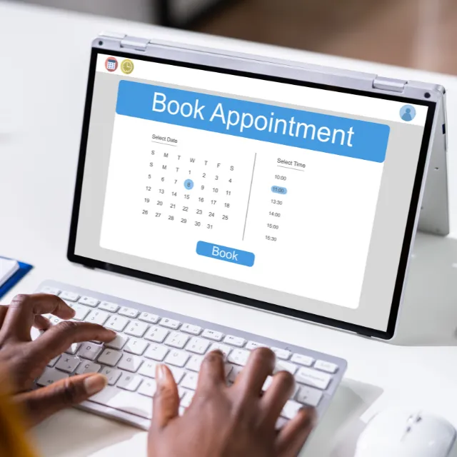 Calendar on laptop screen showing appointment slots