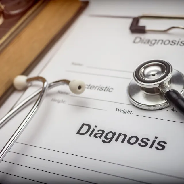 Diagnostic exam tools on table for chiropractic evaluation