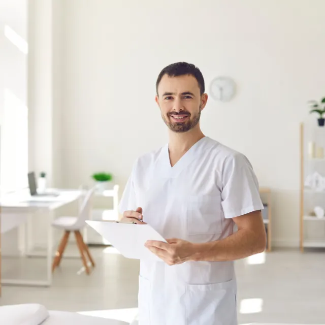 Plano chiropractor providing personalized care during a patient consultation