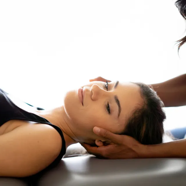 Plano chiropractor performing a cavitating (popping & cracking) adjustment