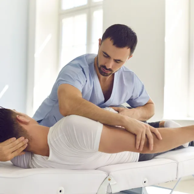 Patient receiving non-invasive spinal decompression therapy in Plano
