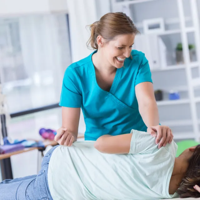 Plano chiropractor customizing decompression program with patient charts