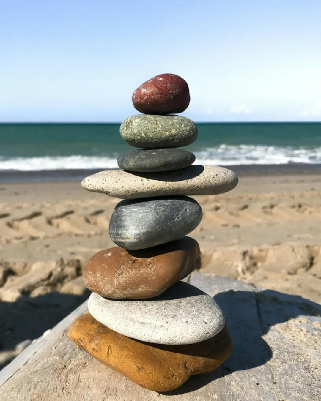 Stackfof rocks with beach landscape