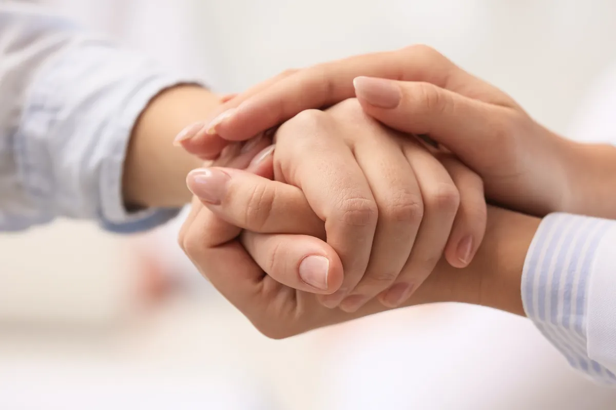 supportive hand hold