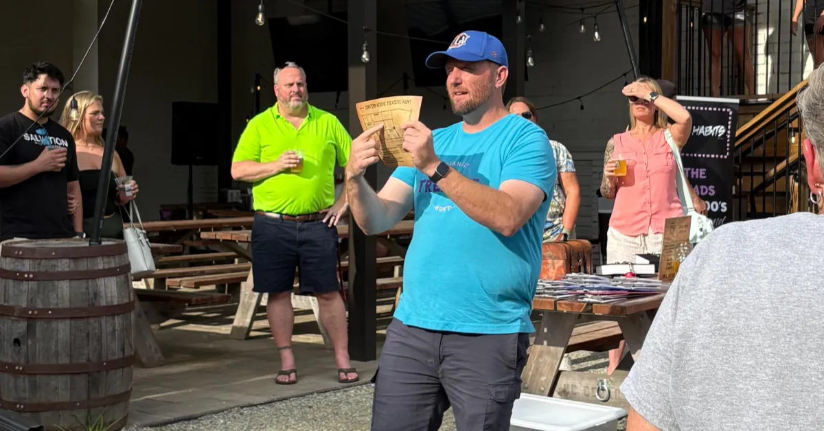 Triangle Treasure Hunt guide giving a pre-hunt briefing.