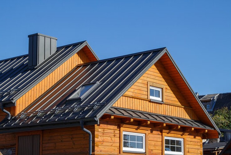 Standing seam metal roof on a wood-sided home 