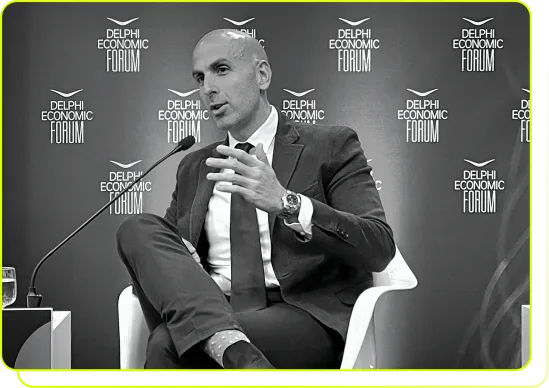 a room with a table, chairs and a large window