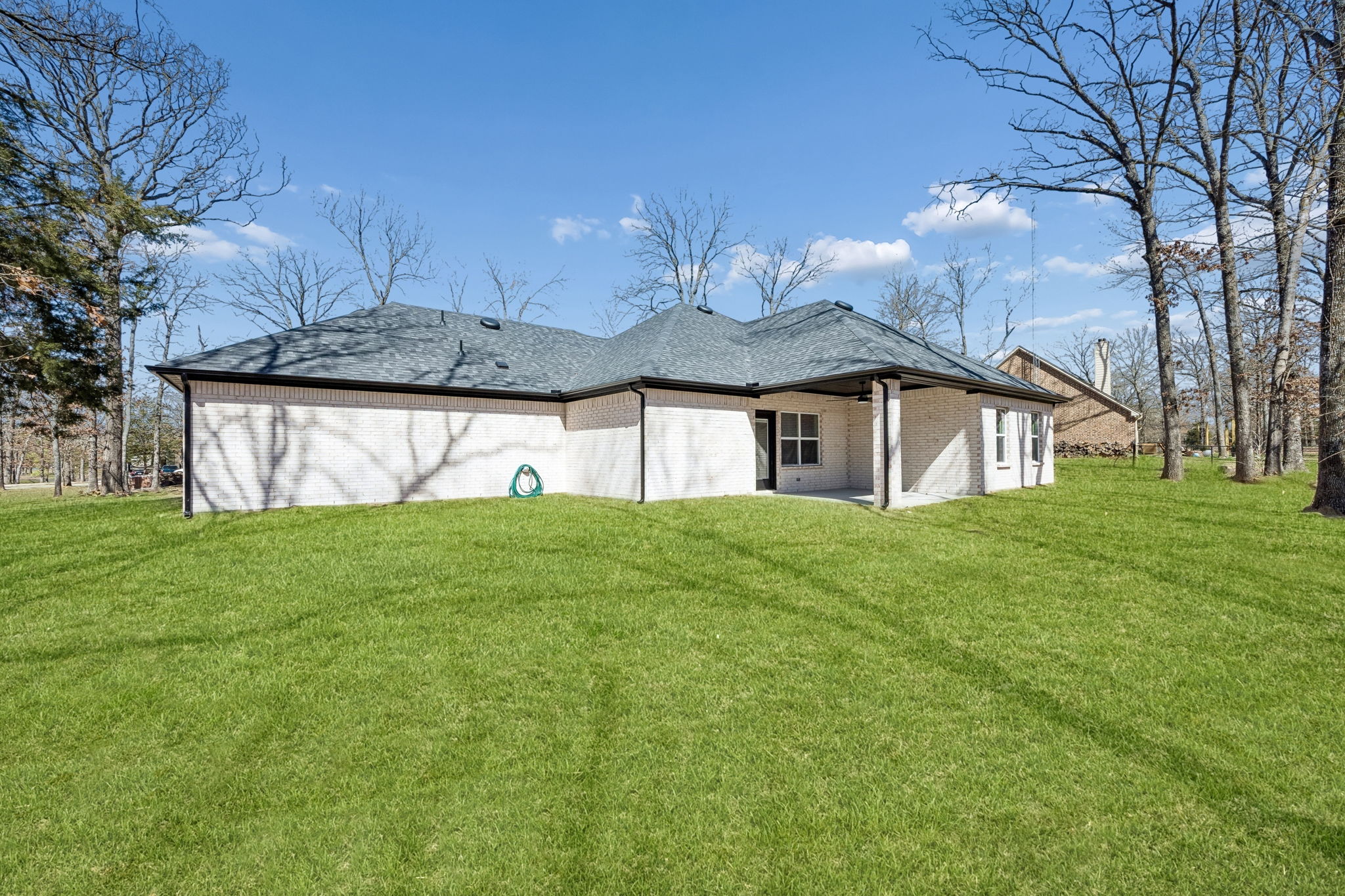 Texas Prime custom home great room with beams and large windows