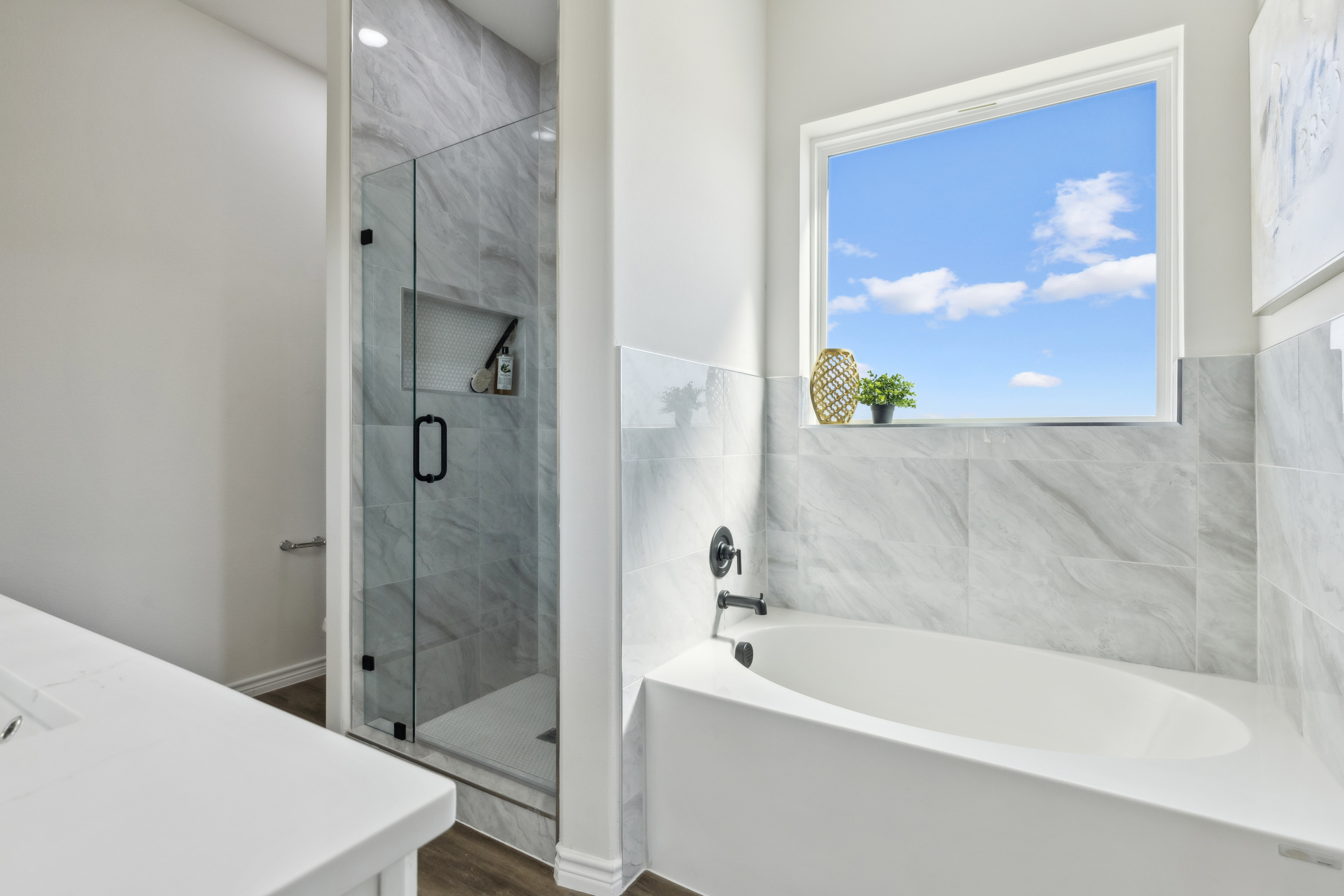 Texas Prime farmhouse master bathroom with freestanding tub