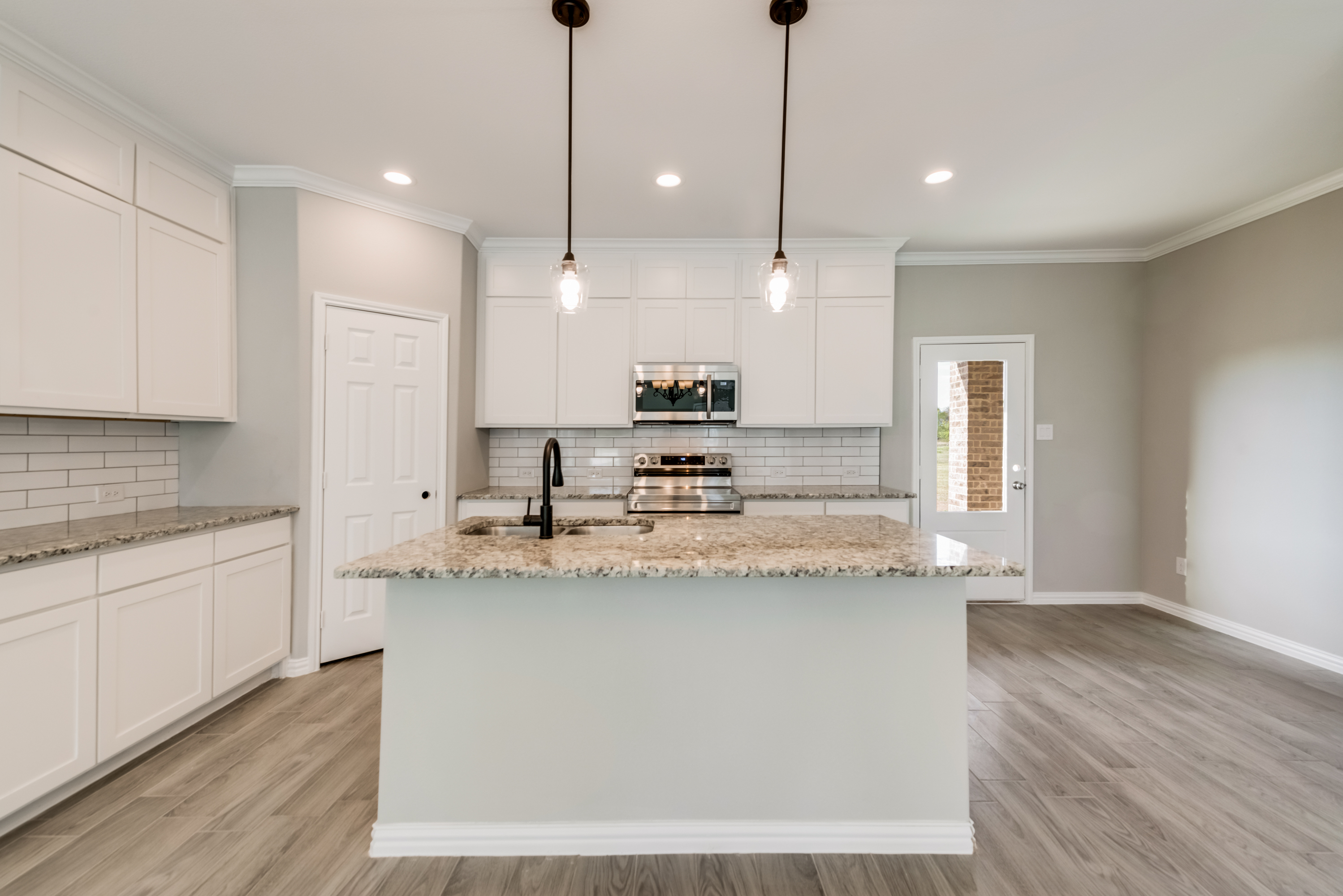 Texas Prime ranch kitchen with natural wood and stone elements