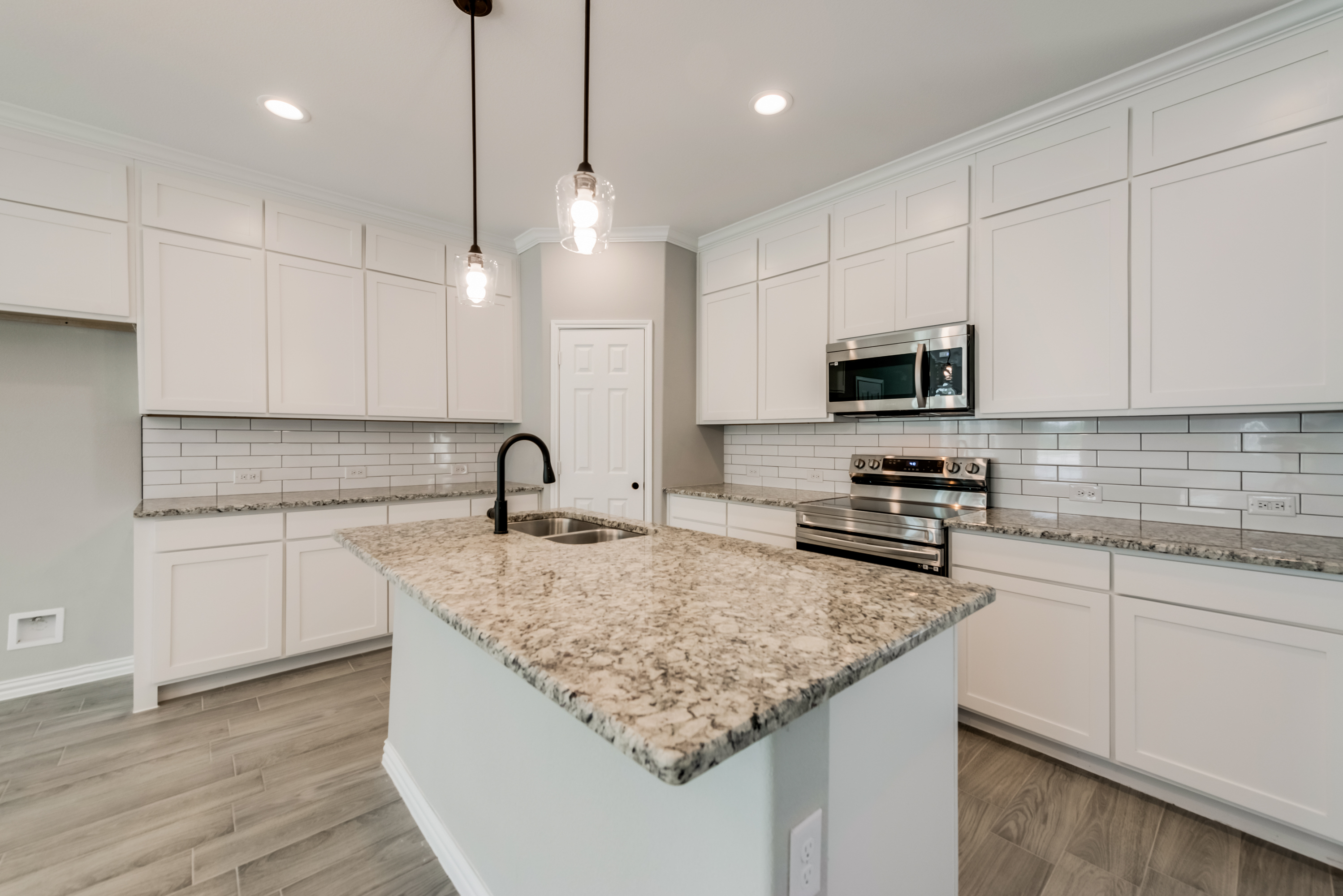 Texas Prime ranch kitchen with natural wood and stone elements