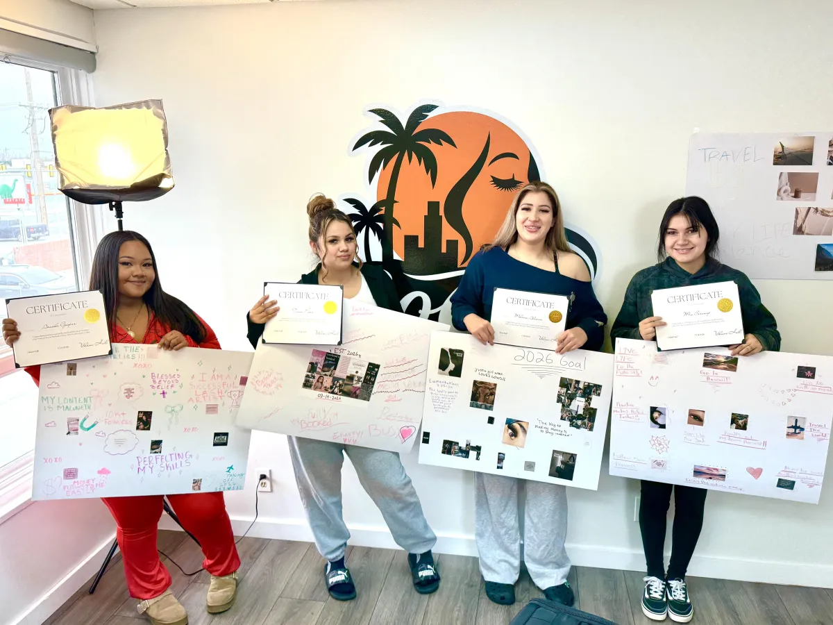 woman in red dress holding bouquet of flowers