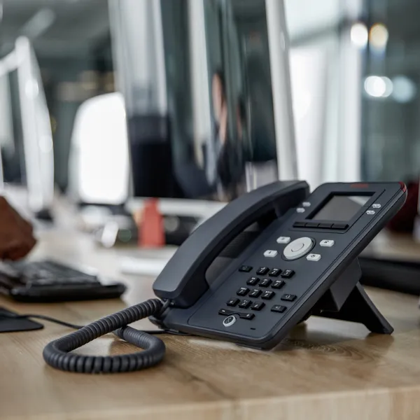 Modern VoIP desk phone on transparent background