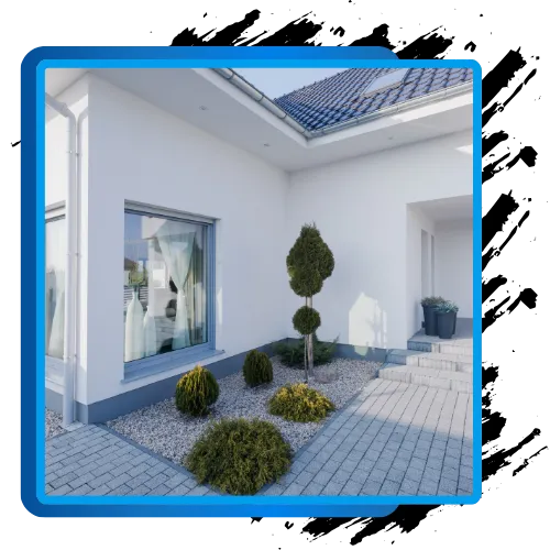 Exterior of a home with fresh paint and landscaping, showcasing curb appeal and exterior painting services.