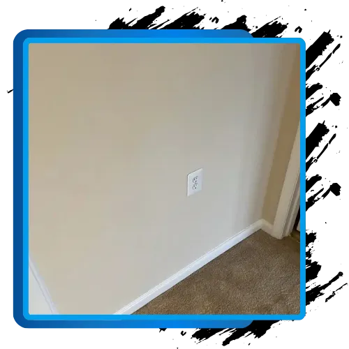 Repaired drywall wall and outlet showcasing Liberty Painting’s seamless finish.