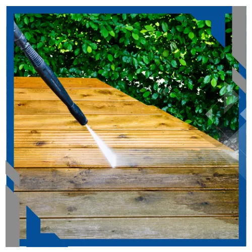 Power washing deck surface preparing for painting and staining by Liberty Painting.