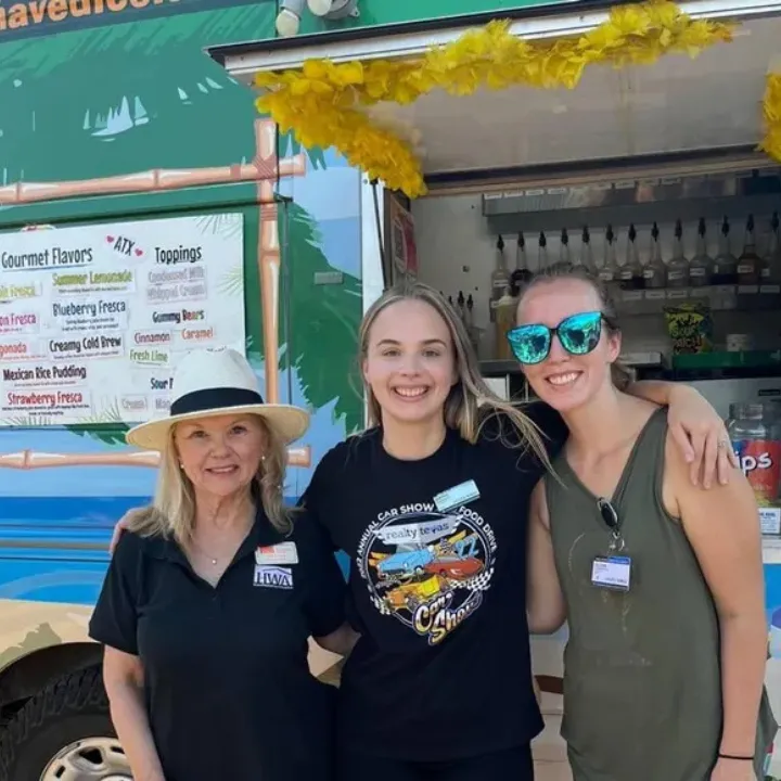 Batya Porter engaging with the local community at a food truck event, connecting with residents in Central Texas.