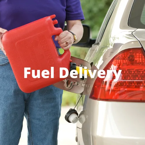 Woman talking on phone waiting for roadside assistance