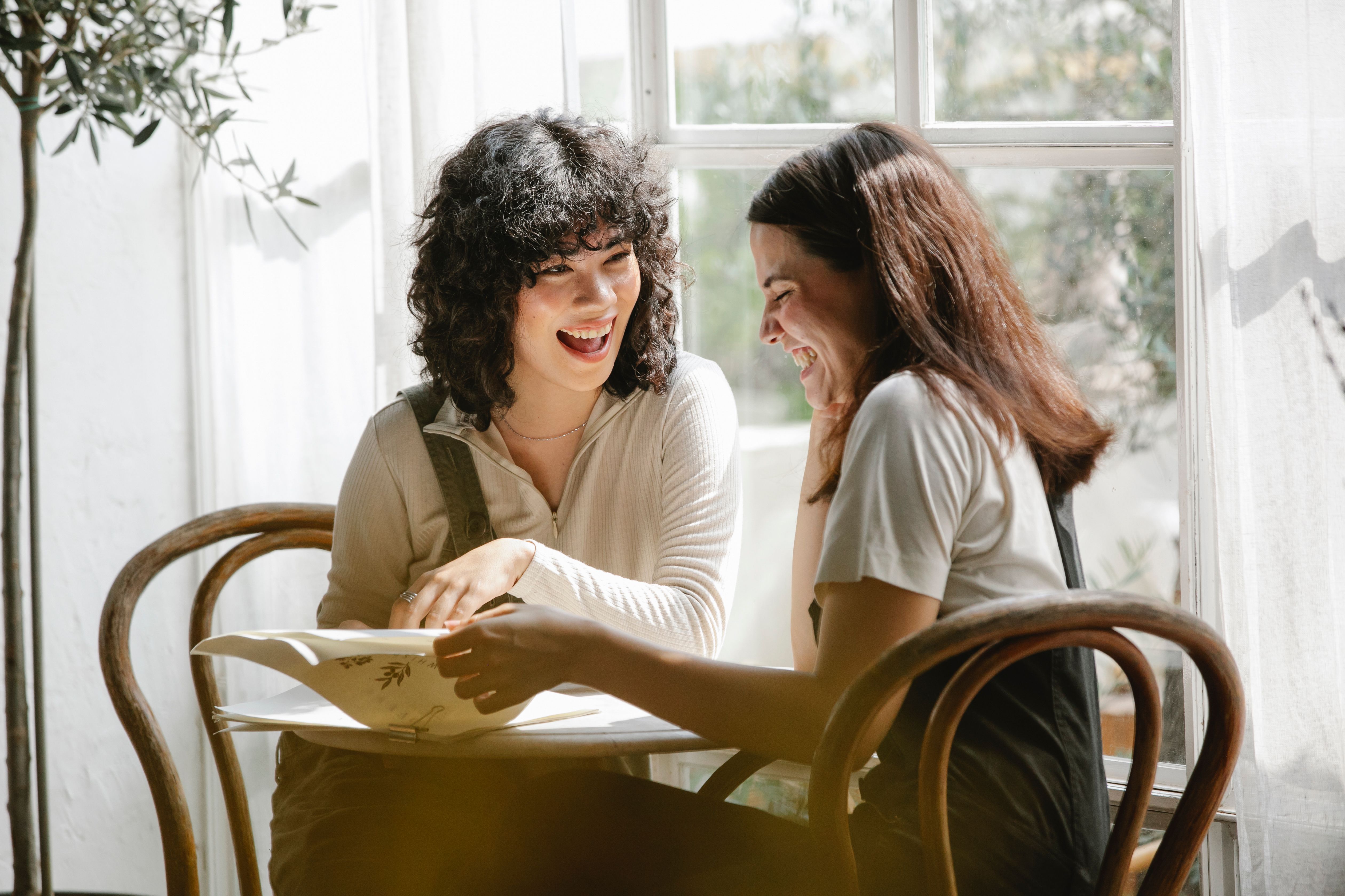two women excited about their work