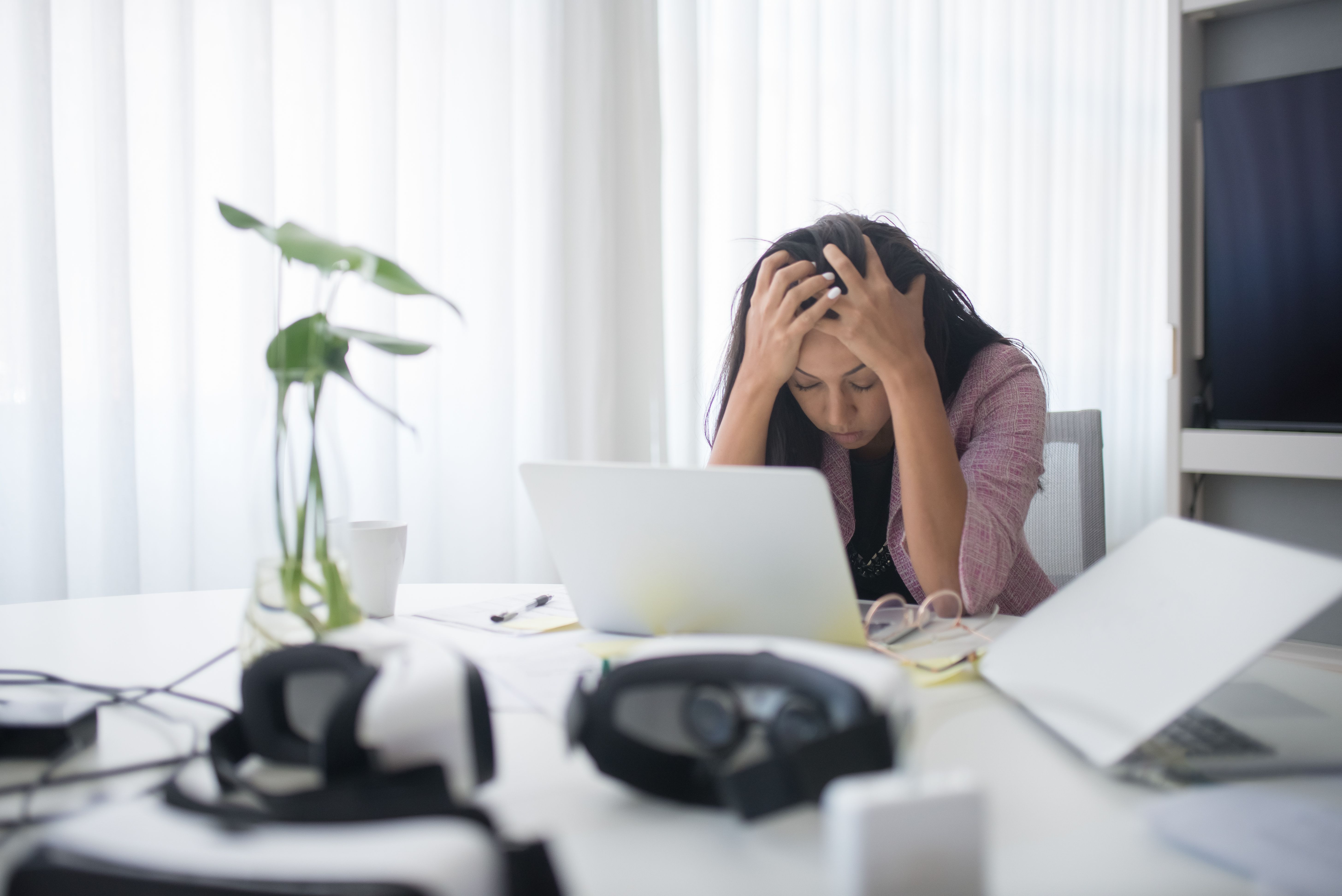 frustrated woman at her desk