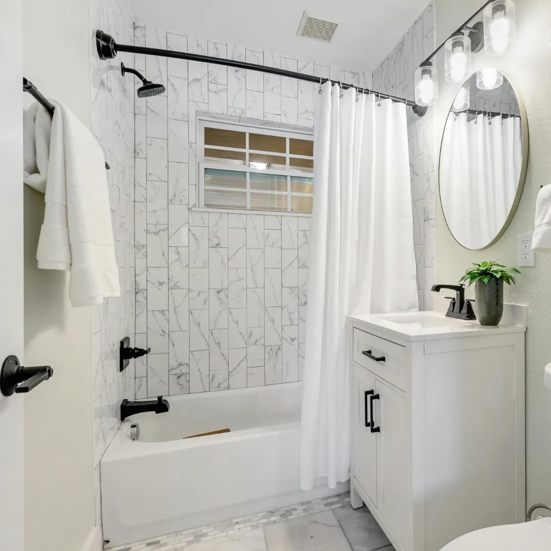 bathroom remodeling with white tile shower vanity and modern fixtures in egg harbor City NJ