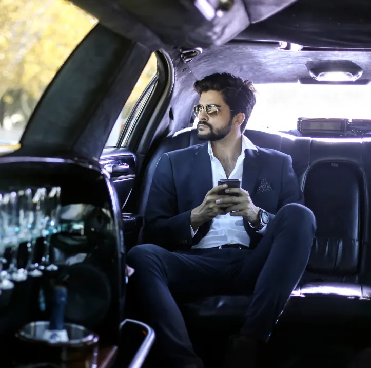 Wedding Couple in Limousine