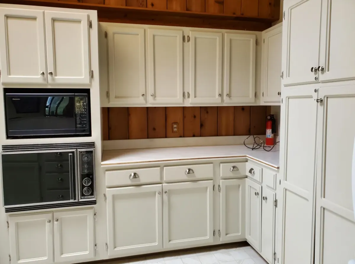Freshly painted white kitchen cabinets