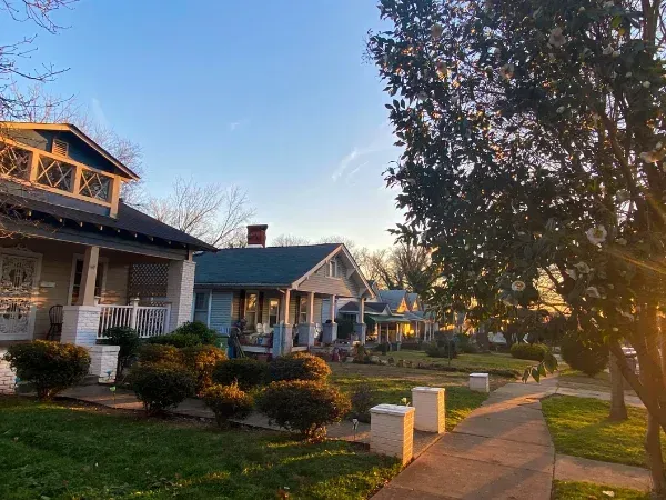 Residential neighborhood homes with sidewalks and front yards in Winston-Salem, NC where Fresh Binz336 provides pressure washing and trash bin cleaning services.