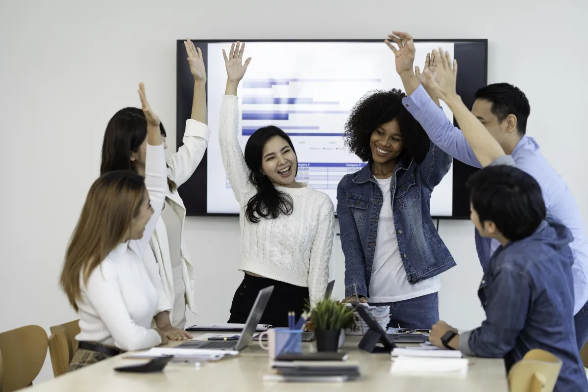 Local business owner celebrating increased foot traffic due to improved SEO