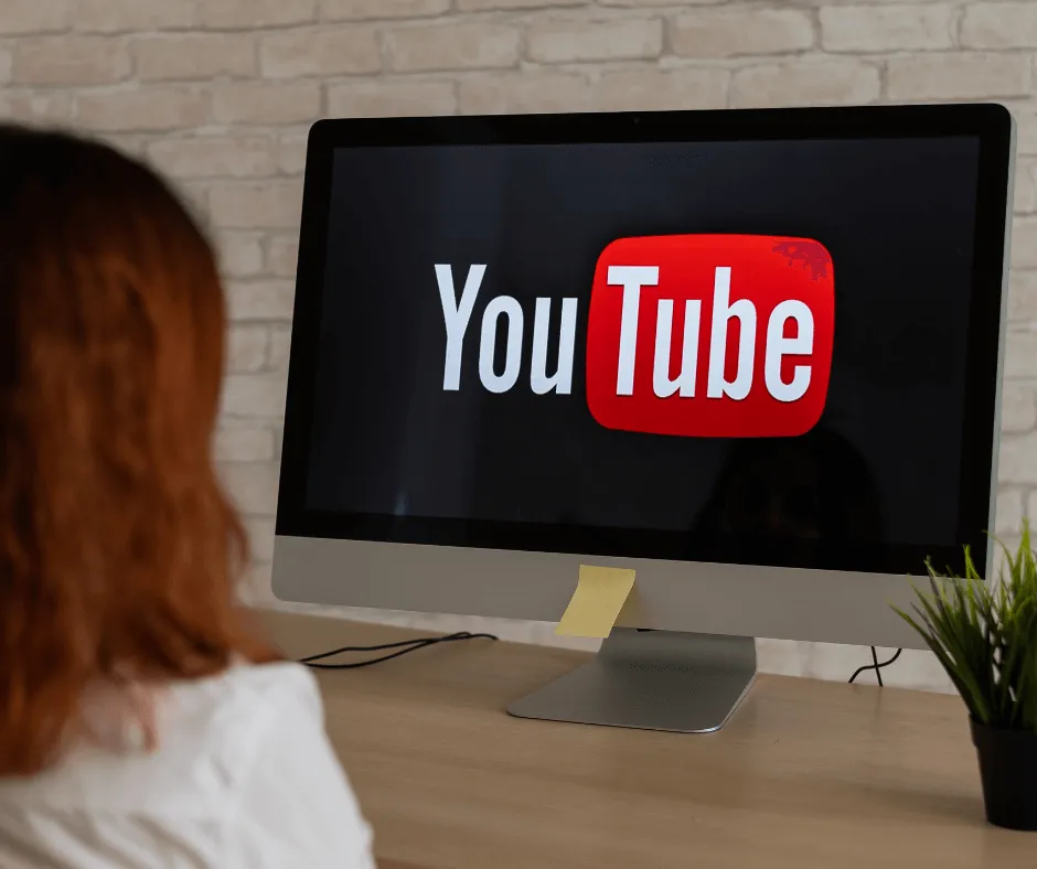 An image of someone watching YouTube on a computer monitor