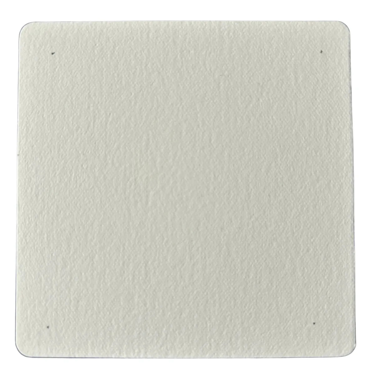 A square paper tile with a pencil dot in each of the four corners.