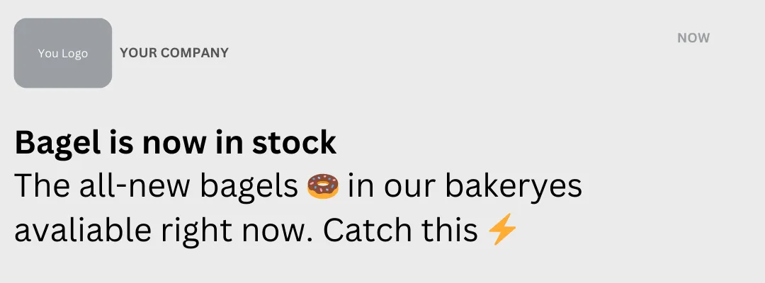 Push notification alerting that 'Bagel is now in stock' from a company, featuring a company logo placeholder and the text 'YOUR COMPANY'. The message highlights the availability of new bagels with the phrases 'The all-new bagels 🥯 in our bakeries available right now. Catch this ⚡' aimed at encouraging immediate customer action. This example illustrates targeted marketing where PUSH messages are sent either to the entire customer base or a selected group, similar to SMS notifications