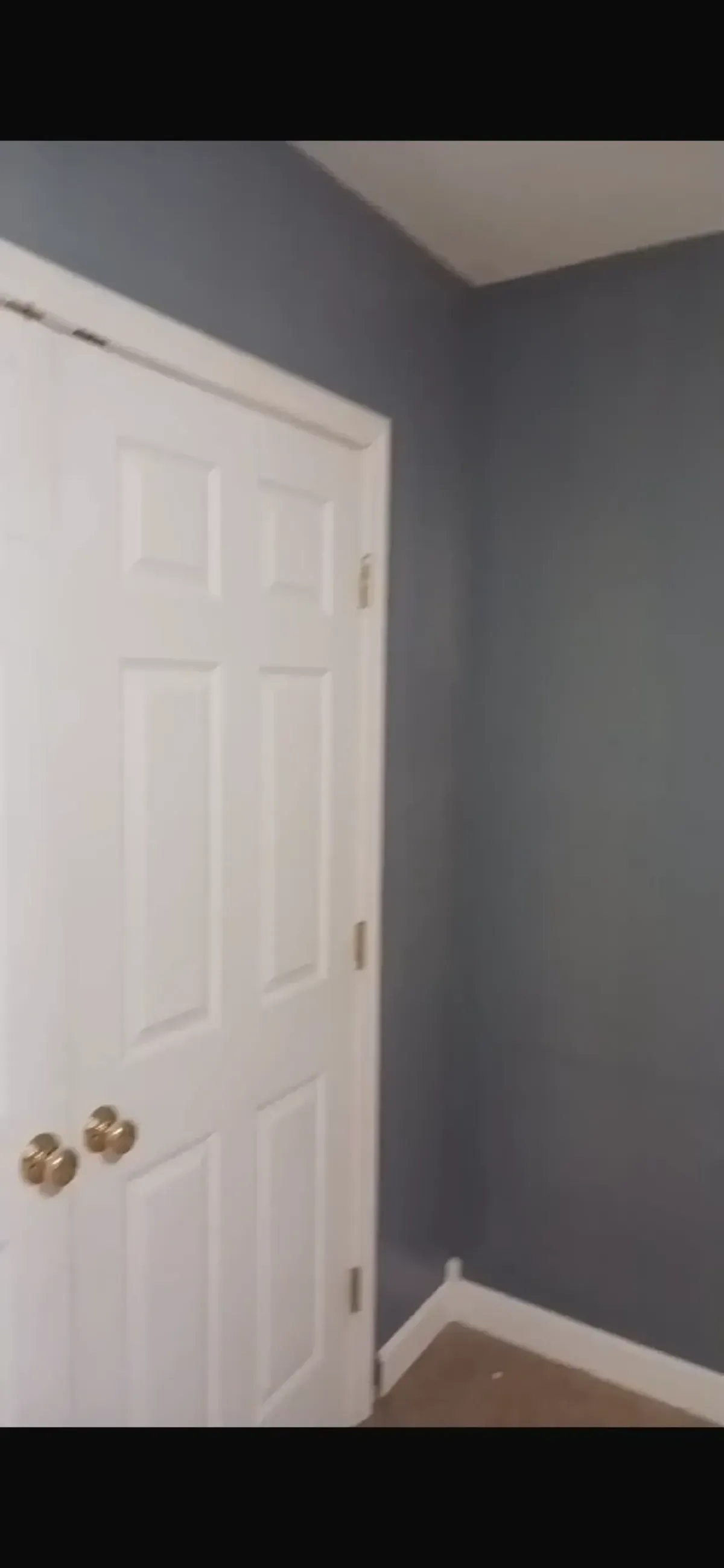 Interior door and trim repainting in Arlington MA home near Broadway with clean semi gloss white finish