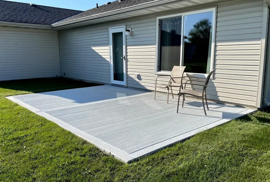 Finished concrete patio attached to the back of a home in Sheboygan, Wisconsin.