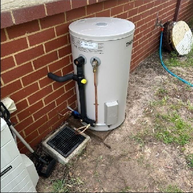 a couple of pipes connected to a building