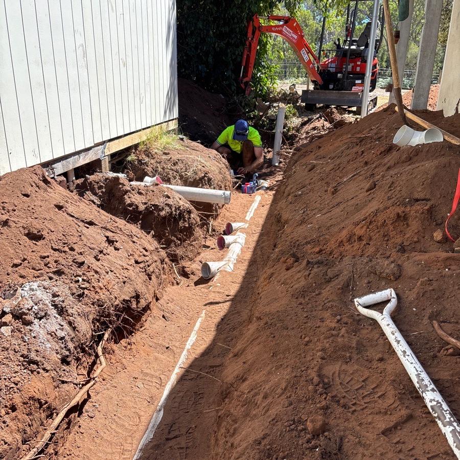 a couple of pipes connected to a building