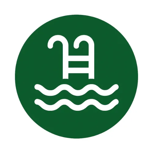 Outdoor swimming pool and lounge chairs at Possum Kingdom RV Resort