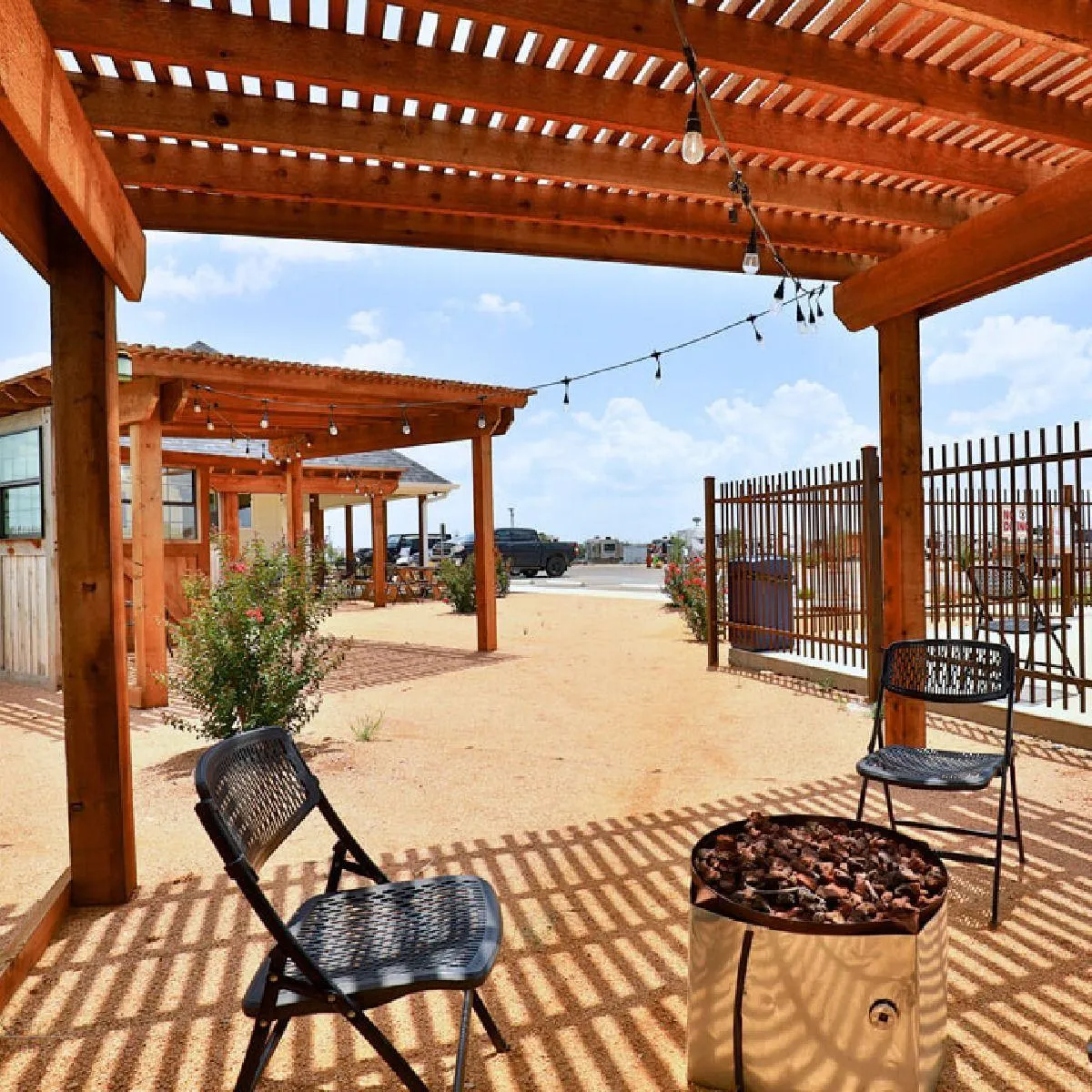 outdoor common area with fire pit near the pool at ridgeview rv resort