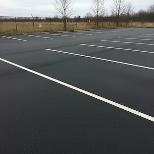 This parking lot was completely repaved and restriped in Bangor, Maine