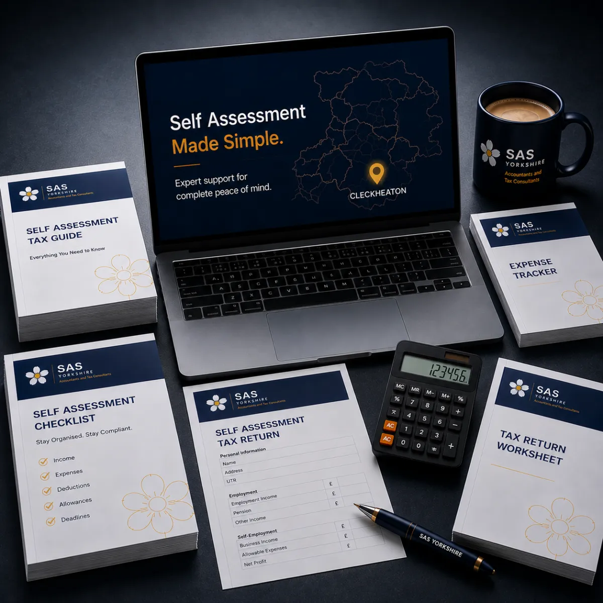 Tax paperwork, calculator, and laptop