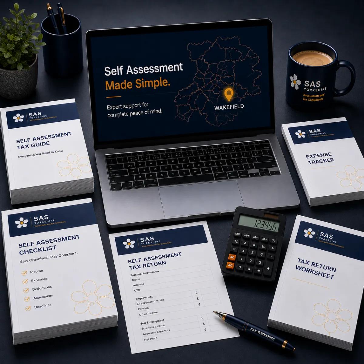 Tax paperwork, calculator, and laptop