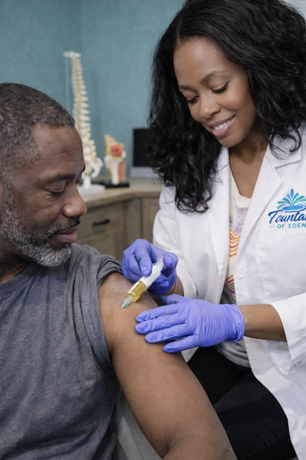 a small bird standing on a lush green field